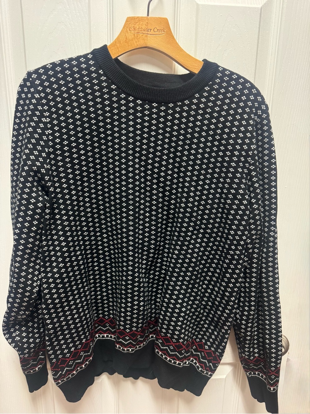 Women's Black Crewneck Sweater with White Knit Pattern and Red Trim
